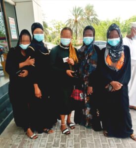 Five Sierra Leonean women being repatriated by Do Bold wait to pickup their Emergency Travel Certificates after completing a COVID test in June 2021